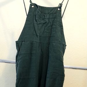 Green linen overalls